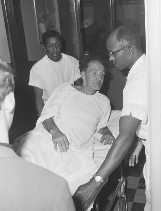 Framed Print : Circus Performer Being Treated for Injuries Framed Print : Circus Performer Being Treated for Injuries