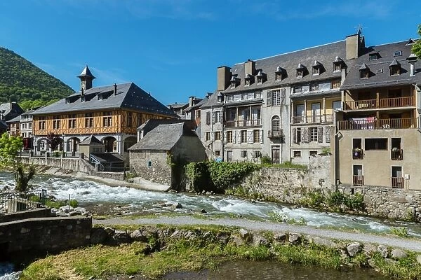The city hall and the River Aure at Arreau, Hautes Pyrenees, France