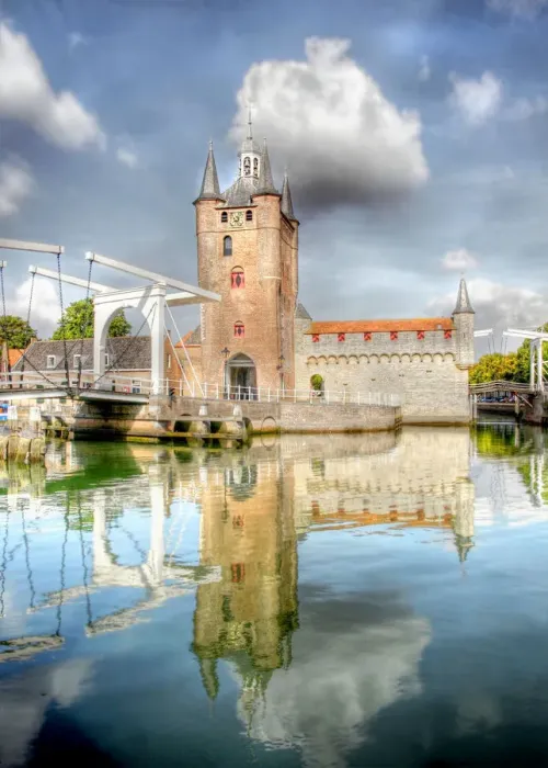 Framed Print : The city portal with a ancient wall and bridge of the town Zierikzee
