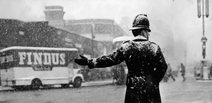 Framed Print : City Snow. 20th November 1965: A policeman directs traffic on a snowy day Framed Print : City Snow. 20th November 1965: A policeman directs traffic on a snowy day