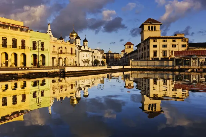 Framed Print : Cityscape buildings reflecting in Havana waterfront, Havana, Cuba Framed Print : Cityscape buildings reflecting in Havana waterfront, Havana, Cuba