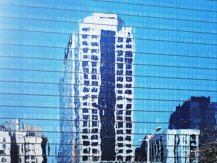 Framed Print : Cityscape reflected in glass facade of building Framed Print : Cityscape reflected in glass facade of building