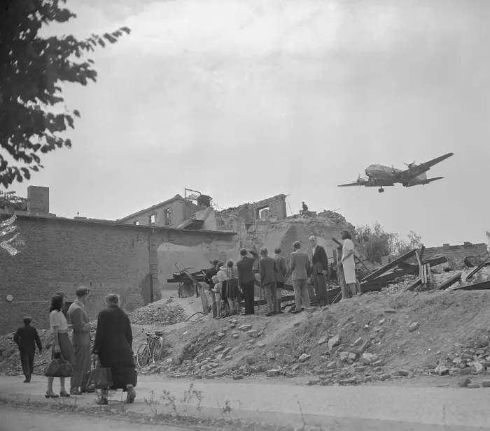 Framed Print : Civilians Wave to American Military Airplane Delivering Supplies Framed Print : Civilians Wave to American Military Airplane Delivering Supplies