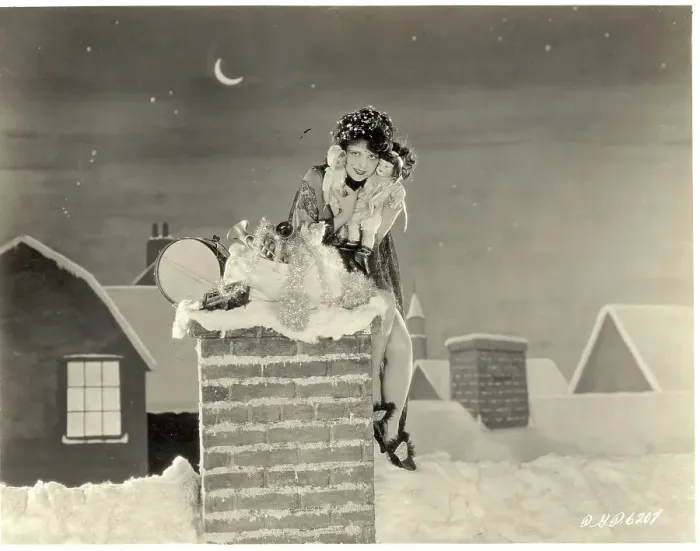 Framed Print : Clara Bow Sitting on Chimney with Toys Framed Print : Clara Bow Sitting on Chimney with Toys