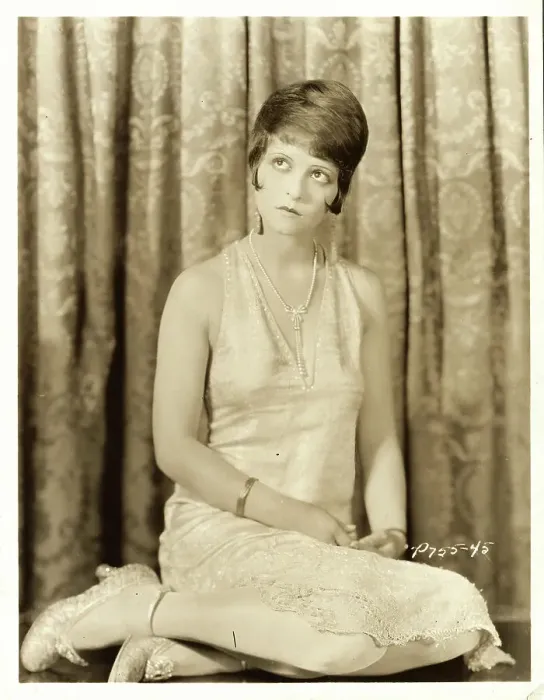 Framed Print : Clara Bow Star Posing in Front of Curtains Framed Print : Clara Bow Star Posing in Front of Curtains