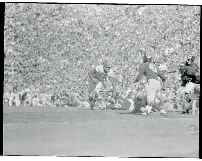 Framed Print : Clarence Peaks Running with Football Framed Print : Clarence Peaks Running with Football