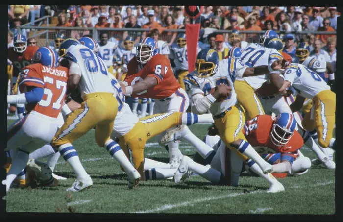 Framed Print : Clarence Williams Running with Ball