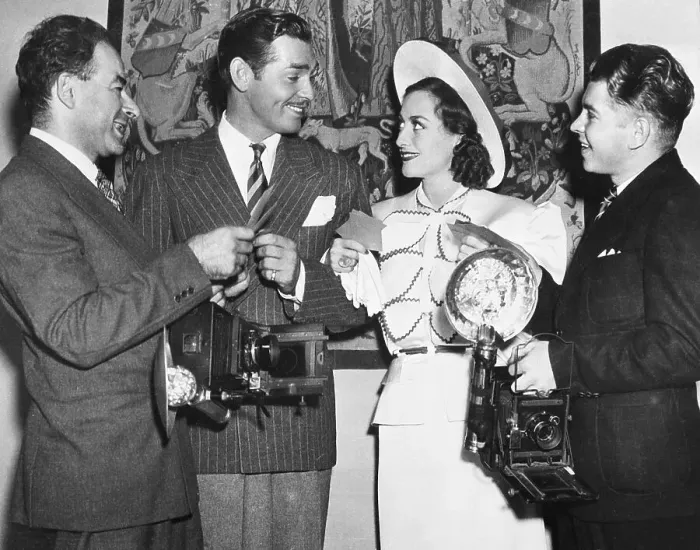 Framed Print : Clark Gable and Joan Crawford With Photographers Framed Print : Clark Gable and Joan Crawford With Photographers