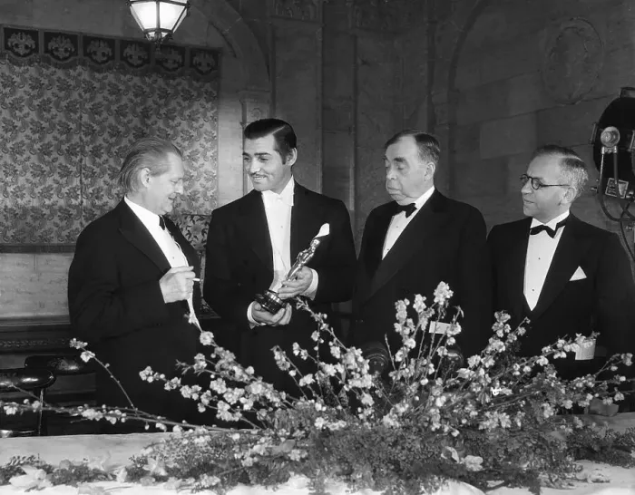 Framed Print : Clark Gable Posing Among Others with His Oscar Framed Print : Clark Gable Posing Among Others with His Oscar