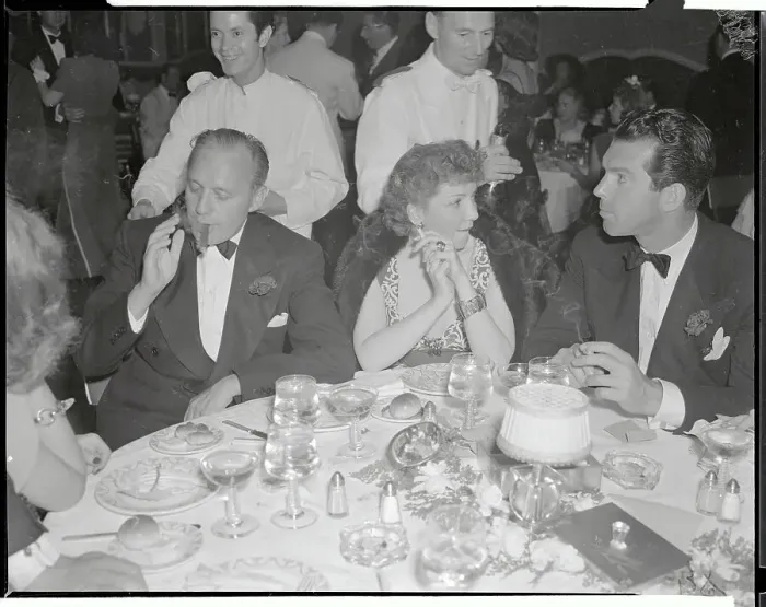Framed Print : Claudette Colbert Having Diner with Friends Framed Print : Claudette Colbert Having Diner with Friends