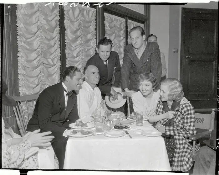 Framed Print : Claudette Colbert at Party with Friends Framed Print : Claudette Colbert at Party with Friends