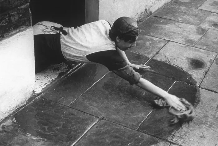 Framed Print : Cleaning A Doorstep Framed Print : Cleaning A Doorstep
