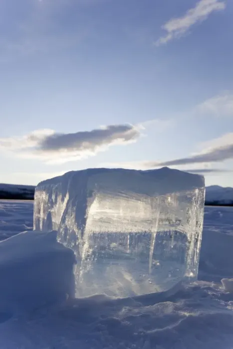 Framed Print : Clear ice cube on frozen Fish Lake, cut out with a chain saw, Yukon Territory, Canada Framed Print : Clear ice cube on frozen Fish Lake, cut out with a chain saw, Yukon Territory, Canada