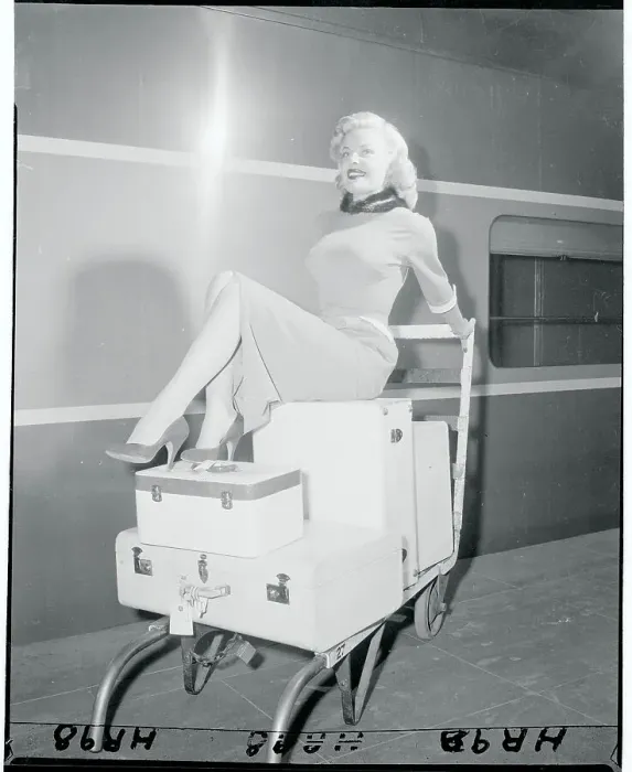 Framed Print : Cleo Moore Posing Atop Her Luggage
