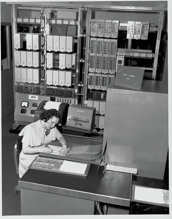 Framed Print : Clerical Worker Using Intelex System for Automatic Train Reservations Framed Print : Clerical Worker Using Intelex System for Automatic Train Reservations