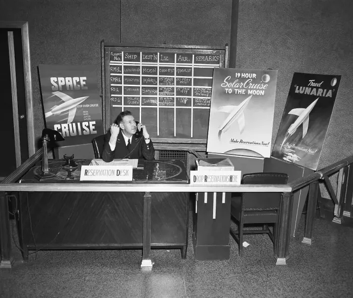 Framed Print : Clerk Taking Space Travel Reservations Framed Print : Clerk Taking Space Travel Reservations