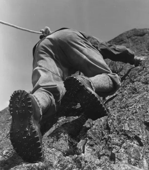 Framed Print : A climber making his way up a rock face Framed Print : A climber making his way up a rock face