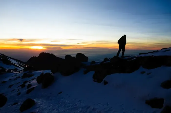 Framed Print : Climber Summiting Mt. Kilimanjaro Framed Print : Climber Summiting Mt. Kilimanjaro