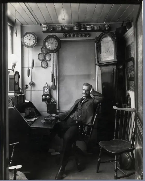 Framed Print : Clock Maker Seated In His Shop Framed Print : Clock Maker Seated In His Shop