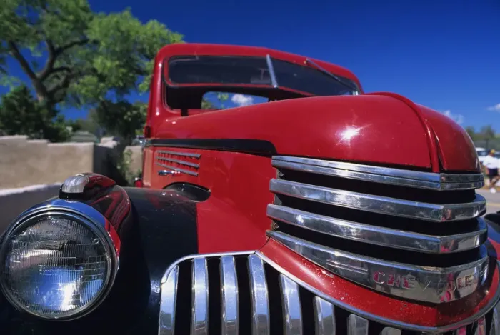 Framed Print : Close up of front of red classic car, New Mexico, USA