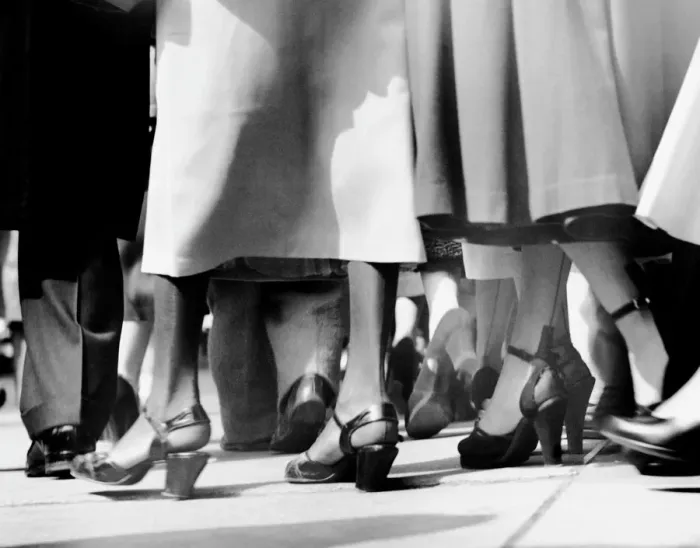 Framed Print : Close-up of feet walking on sidewalk Framed Print : Close-up of feet walking on sidewalk