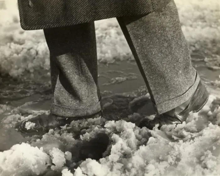 Framed Print : Close-up of mans feet and legs in slush Framed Print : Close-up of mans feet and legs in slush