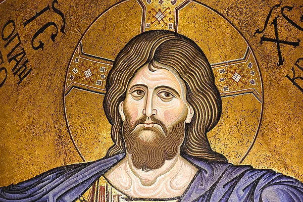 Close-up of Monreale Cathedral with prominent Christ Pantocrator mosaic in the apse at