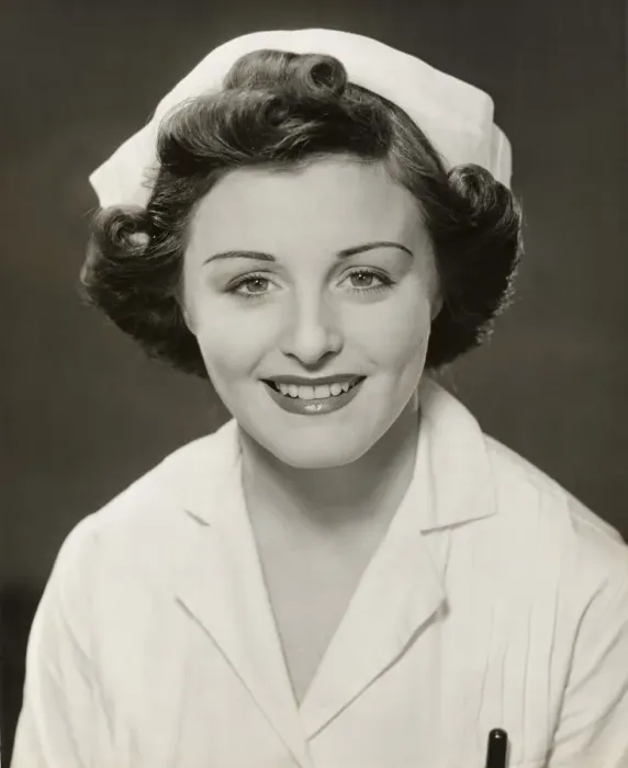Framed Print : Close-up of smiling nurse Framed Print : Close-up of smiling nurse