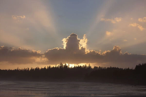 Clouds Are Backlit By The Sun At Sunset At Incinerator Rock Area Of Long Beach In Pacific Rim National Park Near Tofino; British Columbia Canada