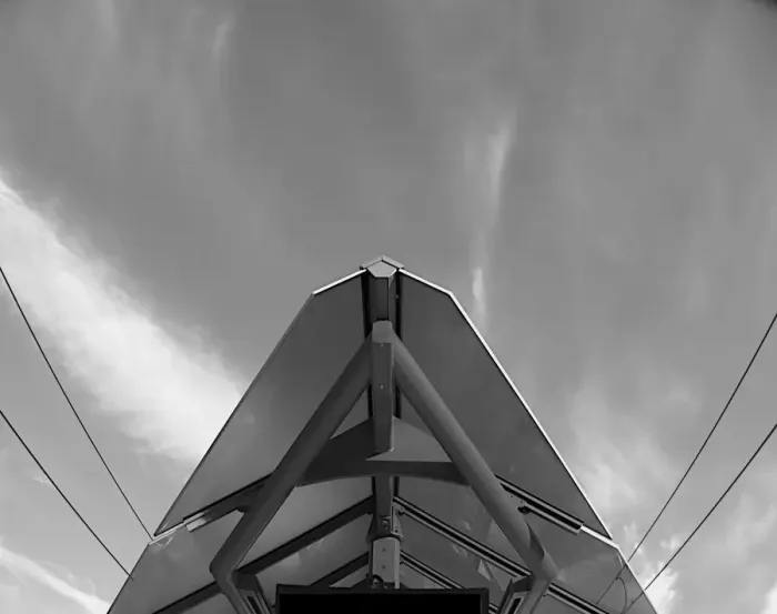Framed Print : Clouds Over Bus Stop