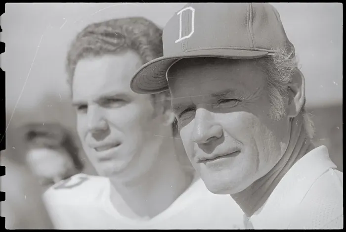 Framed Print : Coach and Quarterback Watching Practice Framed Print : Coach and Quarterback Watching Practice