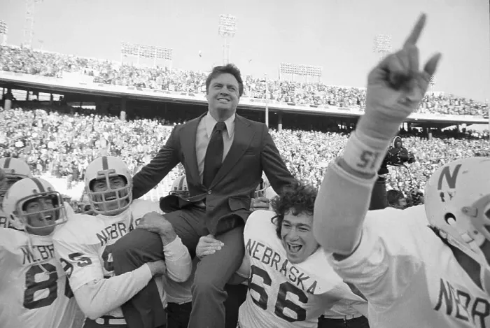 Framed Print : Coach Tom Osborne Being Carried by His Team After Football Game Win Framed Print : Coach Tom Osborne Being Carried by His Team After Football Game Win