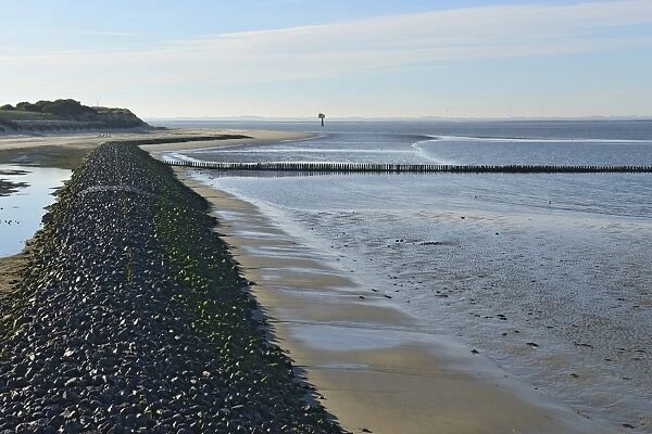 Coastal protection wall made of stones on the western beach, Spiekeroog, East Frisia, Lower Saxony, Germany
