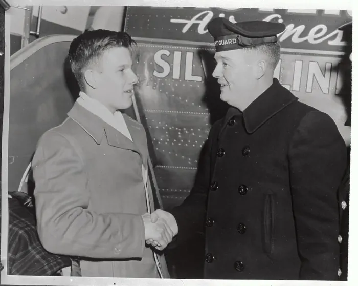 Framed Print : Coastguardman Shaking Hands with Boy Scout Framed Print : Coastguardman Shaking Hands with Boy Scout