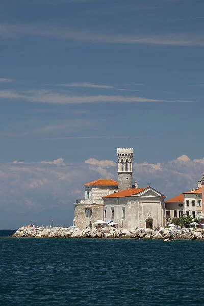 Coastline with the Church of Our Lady of Health, St. Clement Church, and the lighthouse, Piran, Istria, Slovenia