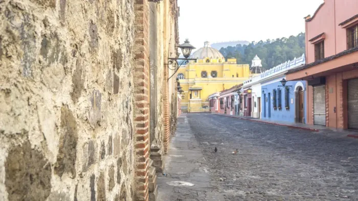 Framed Print : Cobblestone street of Antigua, La Merced Church on background Framed Print : Cobblestone street of Antigua, La Merced Church on background