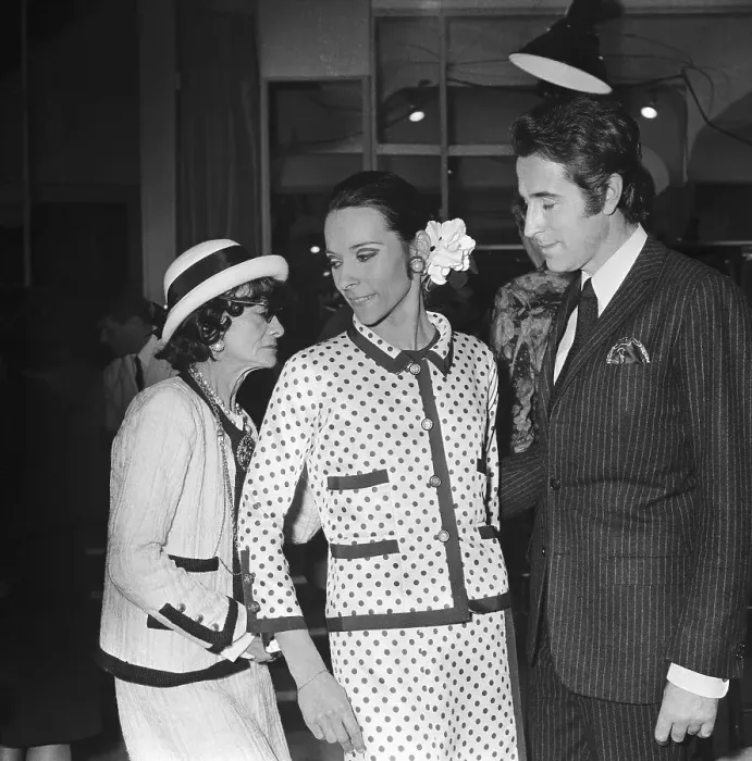 Framed Print : Coco Chanel Standing with Guests Framed Print : Coco Chanel Standing with Guests