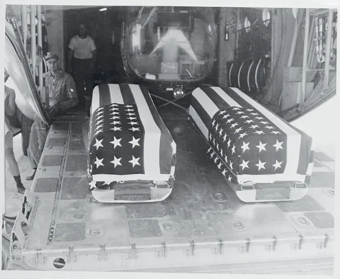 Framed Print : Coffins Being Airlifted From Desert Framed Print : Coffins Being Airlifted From Desert