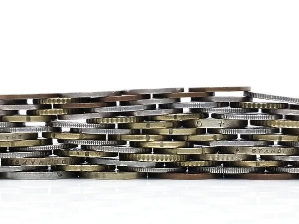 Coins stacked to form a wall