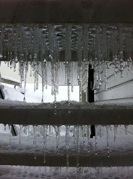 Cold Snap. Icicles coating the underside of stairs