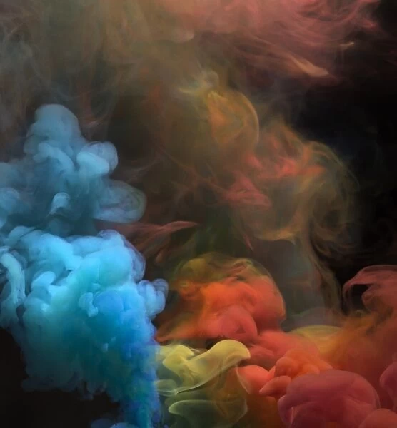 Smoke. Colored smoke that rises up and mixes in beautiful abstractions