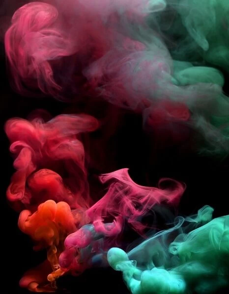 Smoke. Colored smoke that rises up and mixes in beautiful abstractions