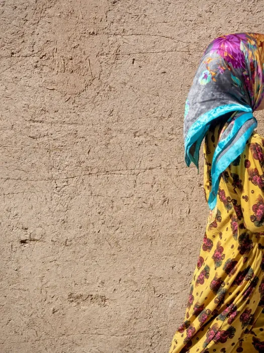 Framed Print : Colorful dressed girl in Yazd adobe old town, Iran Framed Print : Colorful dressed girl in Yazd adobe old town, Iran