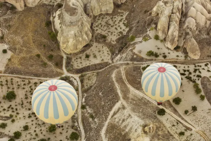 Framed Print : Colorful hot air balloons flying over Red valley at Cappadocia, Anatolia, Turkey. Volcanic mountains in Goreme national park Framed Print : Colorful hot air balloons flying over Red valley at Cappadocia, Anatolia, Turkey. Volcanic mountains in Goreme national park