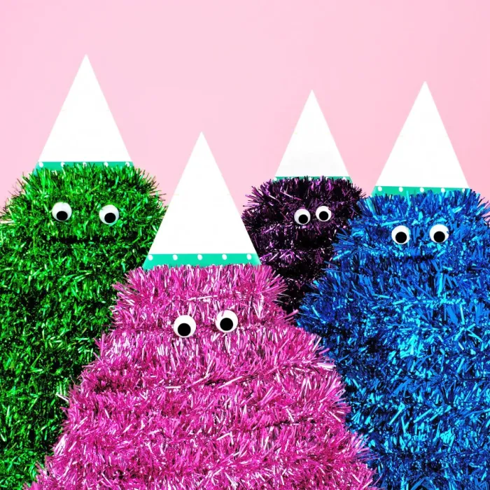 Framed Print : Colorful tinsel characters with google eyes Framed Print : Colorful tinsel characters with google eyes