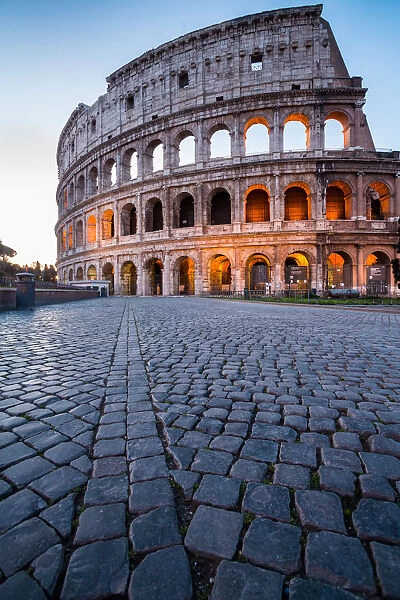 The Colosseum at sunrise in Rome, Italy