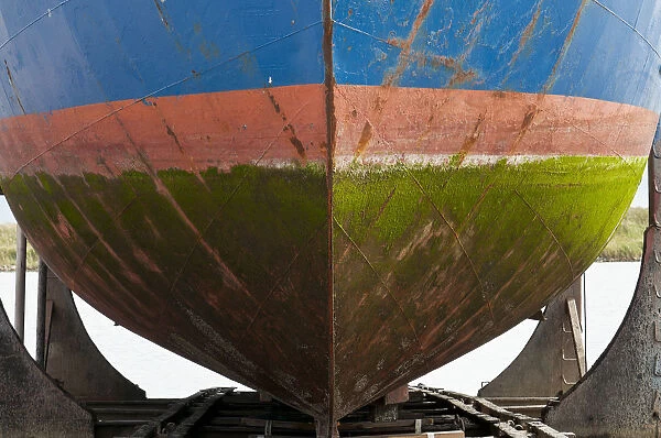 Coloured hull covered with algae in the dry dock, Hvide Sande, Jutland, Denmark, Europe