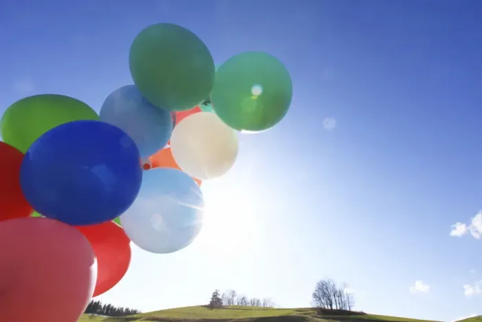 Framed Print : Many colourful balloons in a green landscape, Allgaeu, Germany, Europe