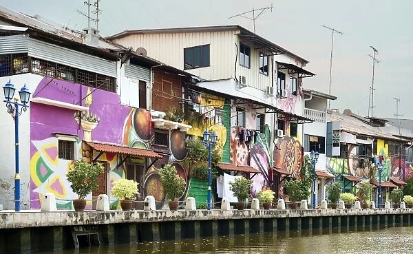 Colourful houses line Melaka River