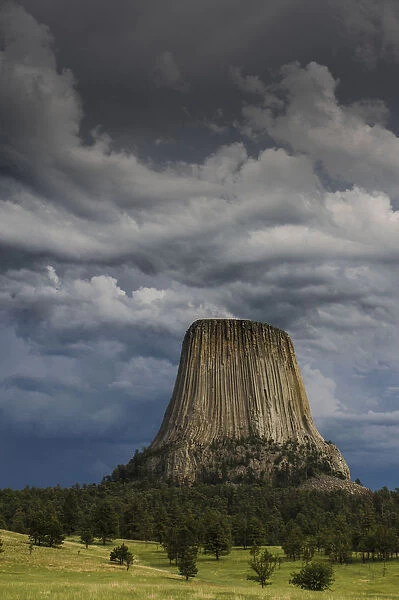 Columnar basalt formation and approaching thunderstorm, Devils Tower National Monument, Wyoming, USA